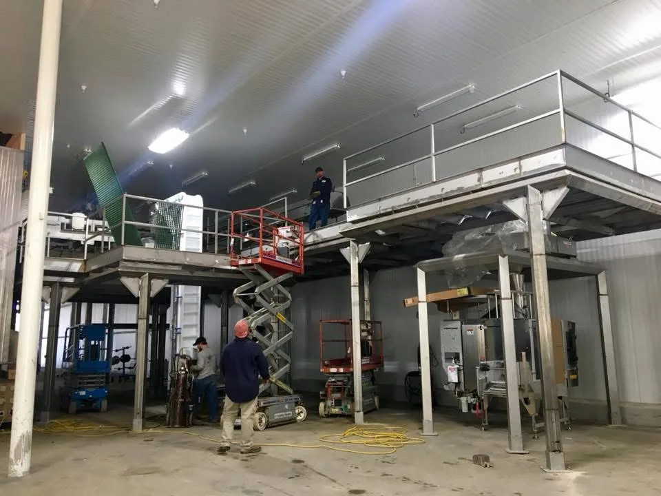 Equipment mezzanine install — FabTek Industries